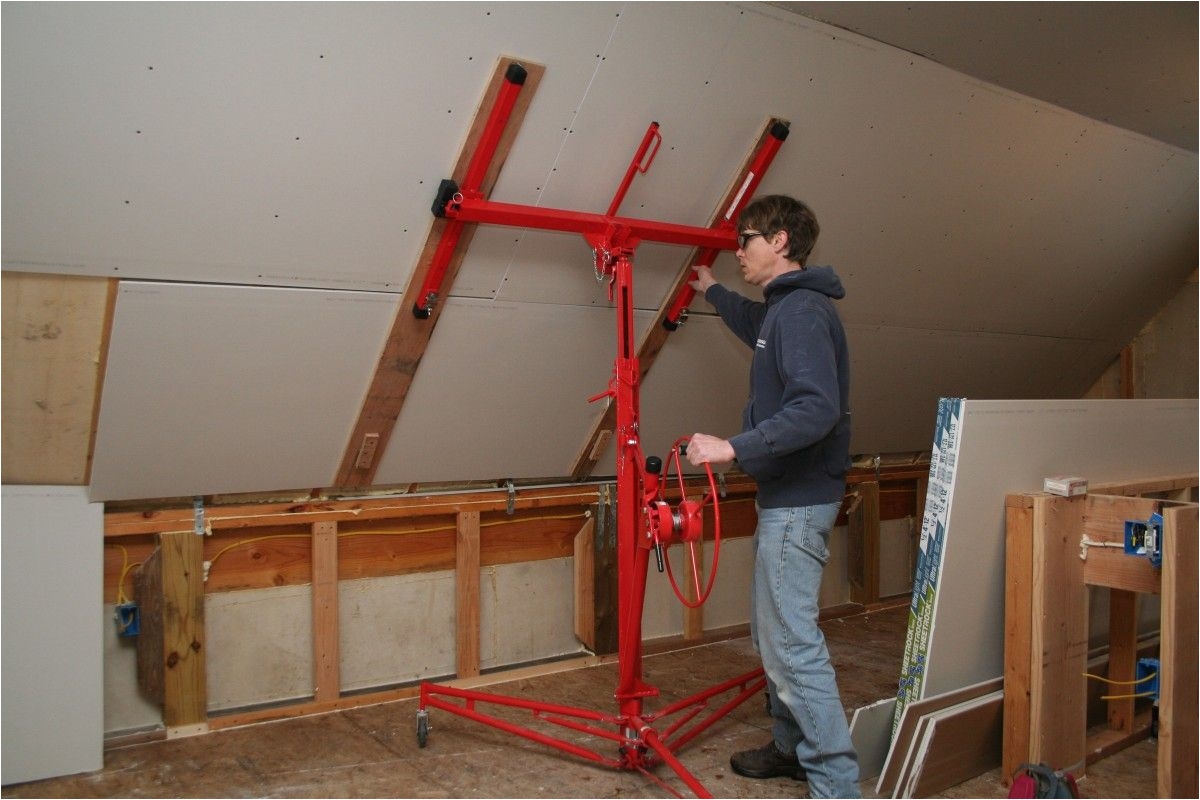 putting up drywall rent a drywall lift to make the job easier