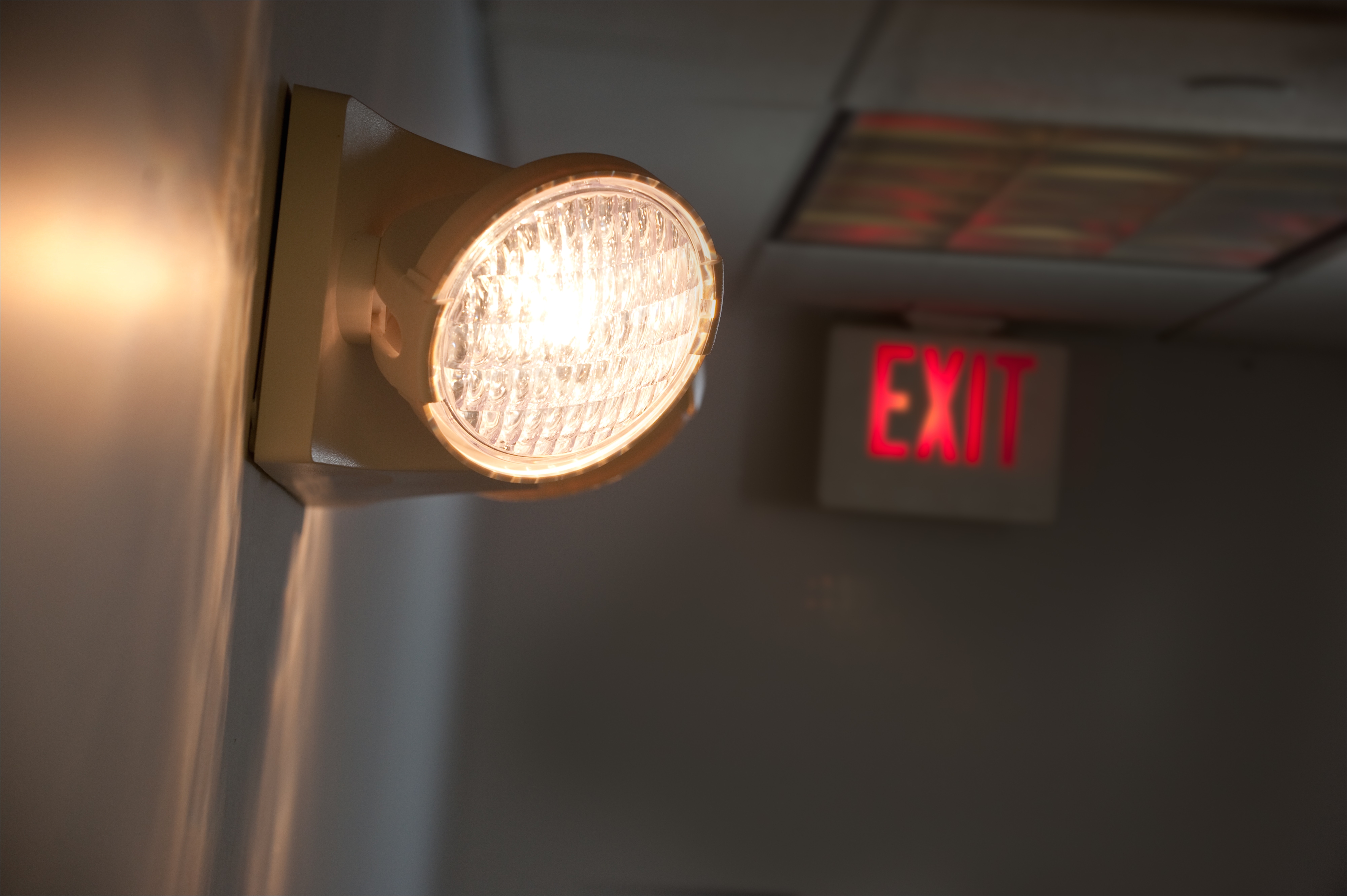 when designing a buildings emergency egress system businesses and building managers must consider illuminated exit signs emergency lighting and lighting