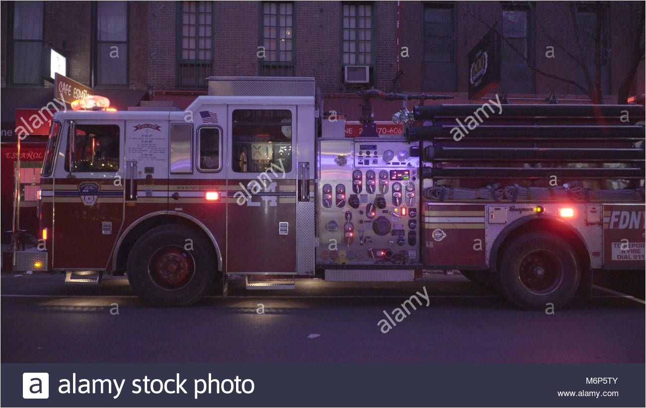 download this stock image new york city december 2016 fdny fire department truck flashing siren lights on call outside a manhattan apartment building