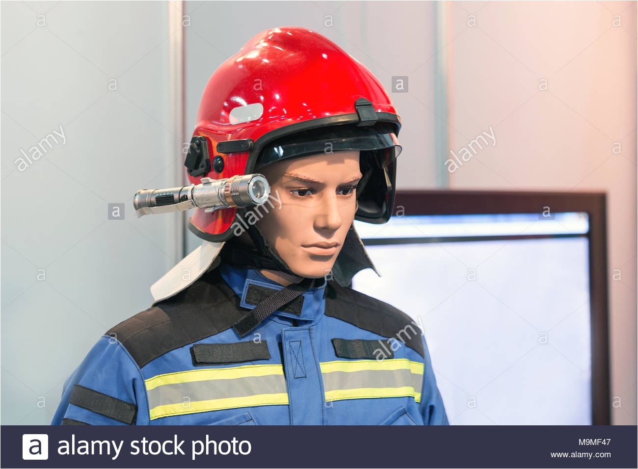 exhibition firefighter dummy in fire fighter helmet and uniform protective rescue wear head light torch