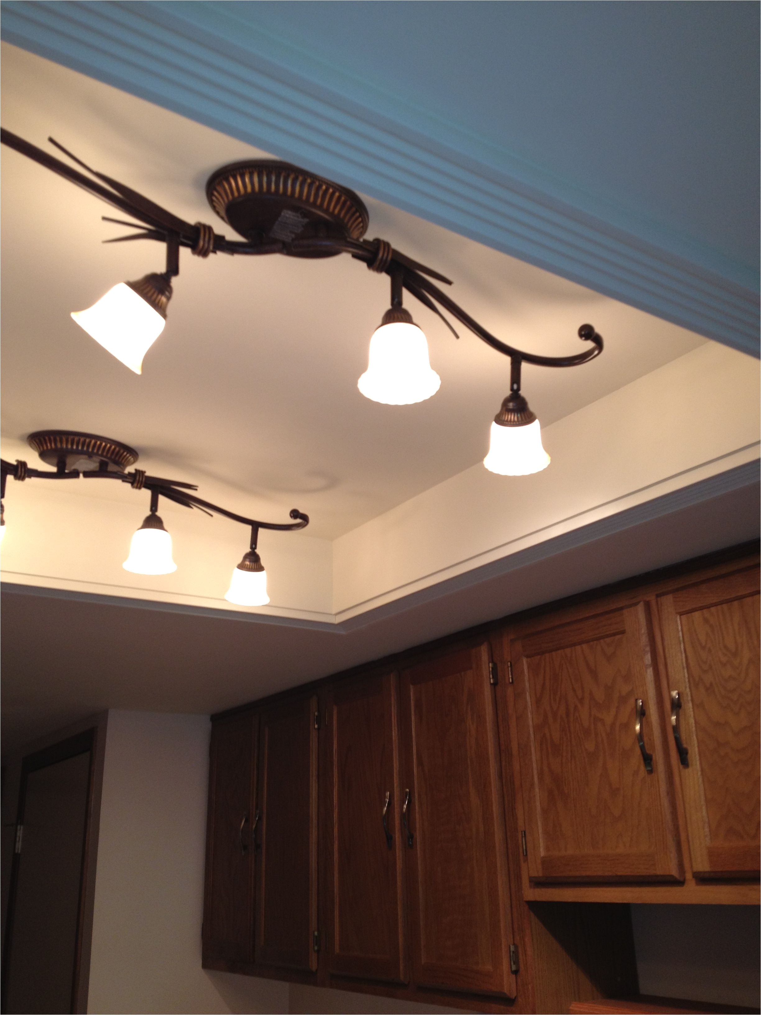 convert that ugly recessed fluorescent ceiling lighting in your kitchen to a beautiful trayed ceiling