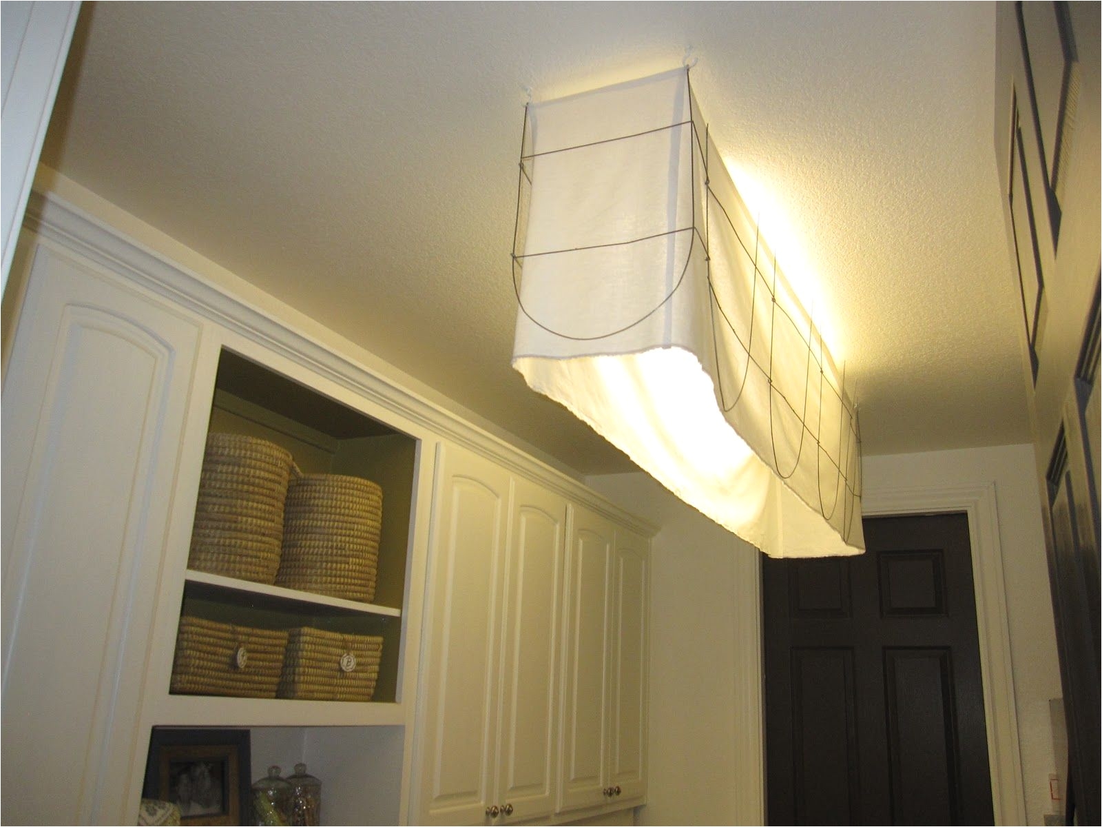 how to cover an ungly fluorescent light fixture thedecoratingduchess com