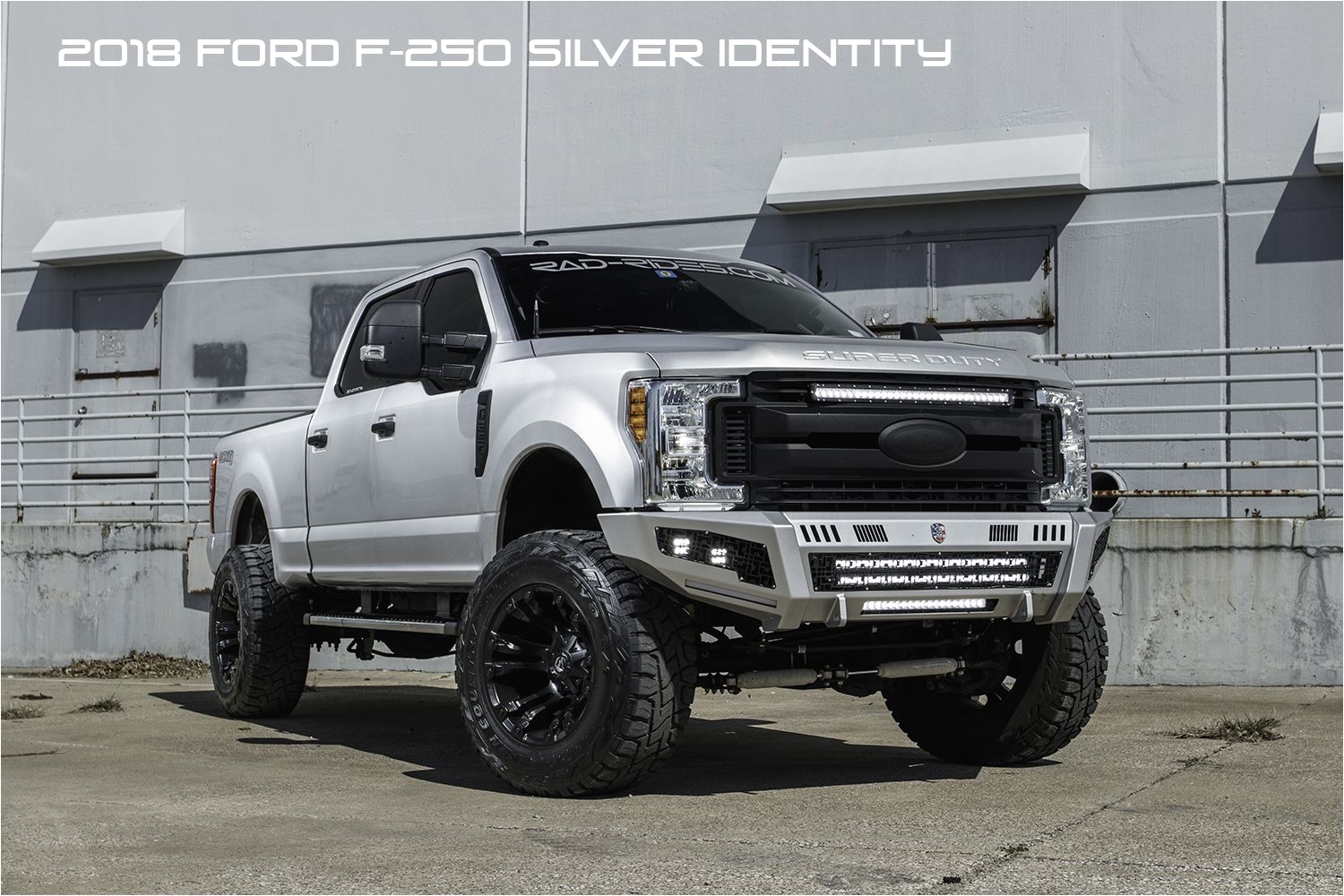2018 ford f250 super duty lifted in silver with fuel vapor wheels and toyo mt tires with road armor identity bumpers with rigid lights in the bumper and