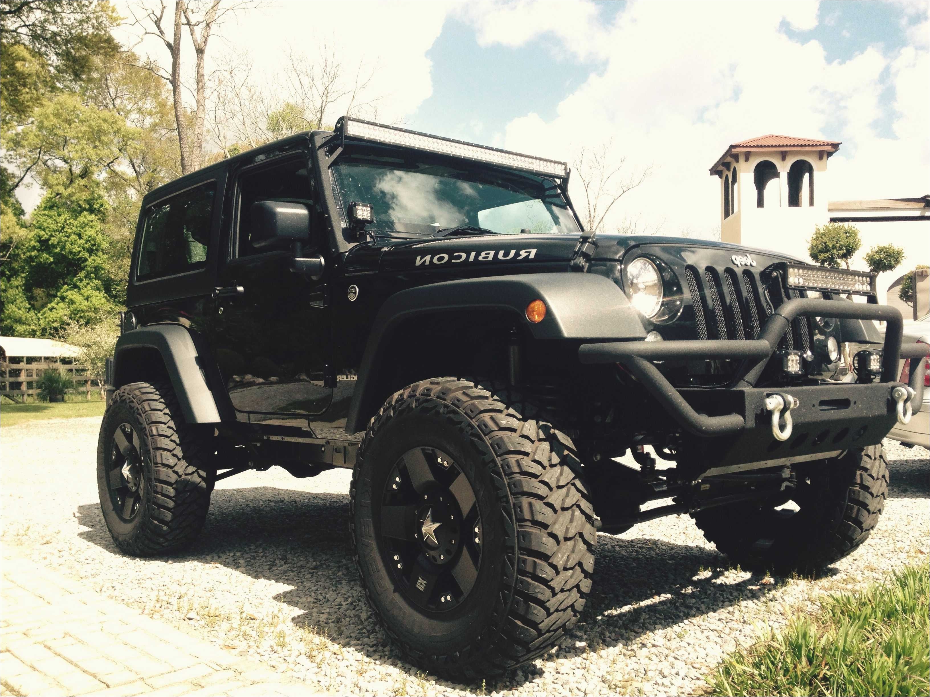 black jeep wrangler 2 door 4 inch lift 35 inch tires black rockstar rims 50 inch