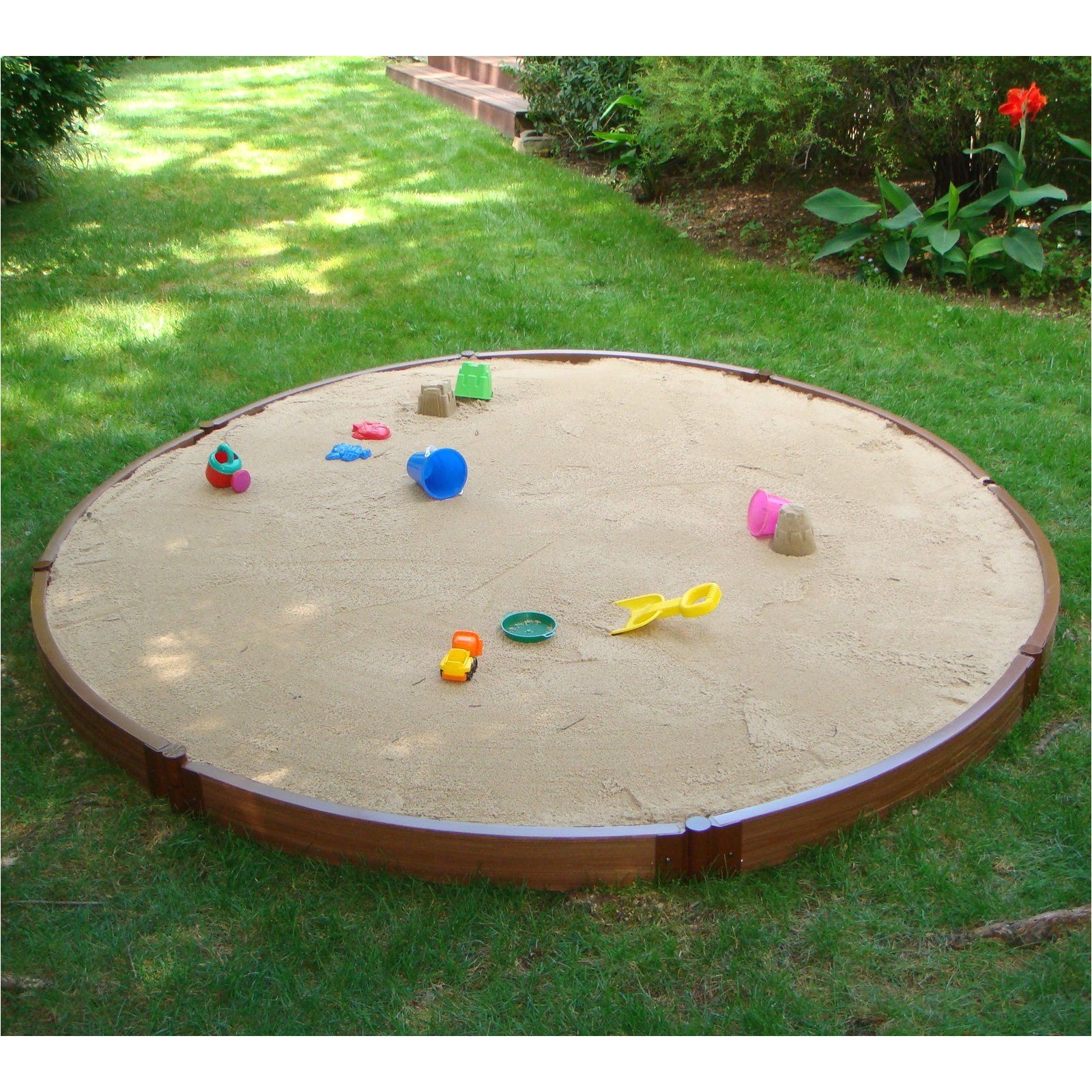 circular sandbox to replace current septic tank disguise could use retaining wall stones instead