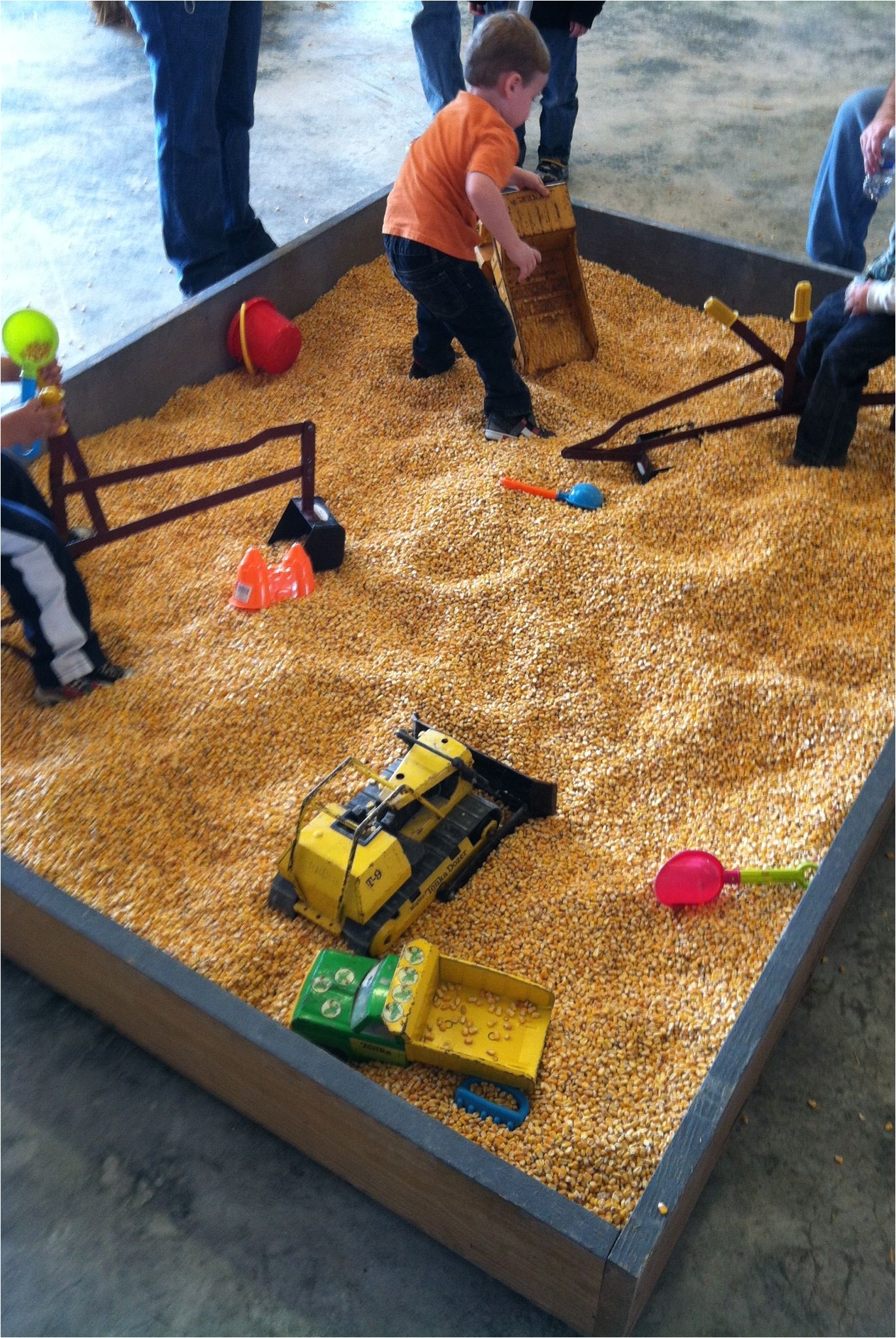 instead of using sand in a sandbox you can use corn kernels its less of a mess and still as much fun for kids