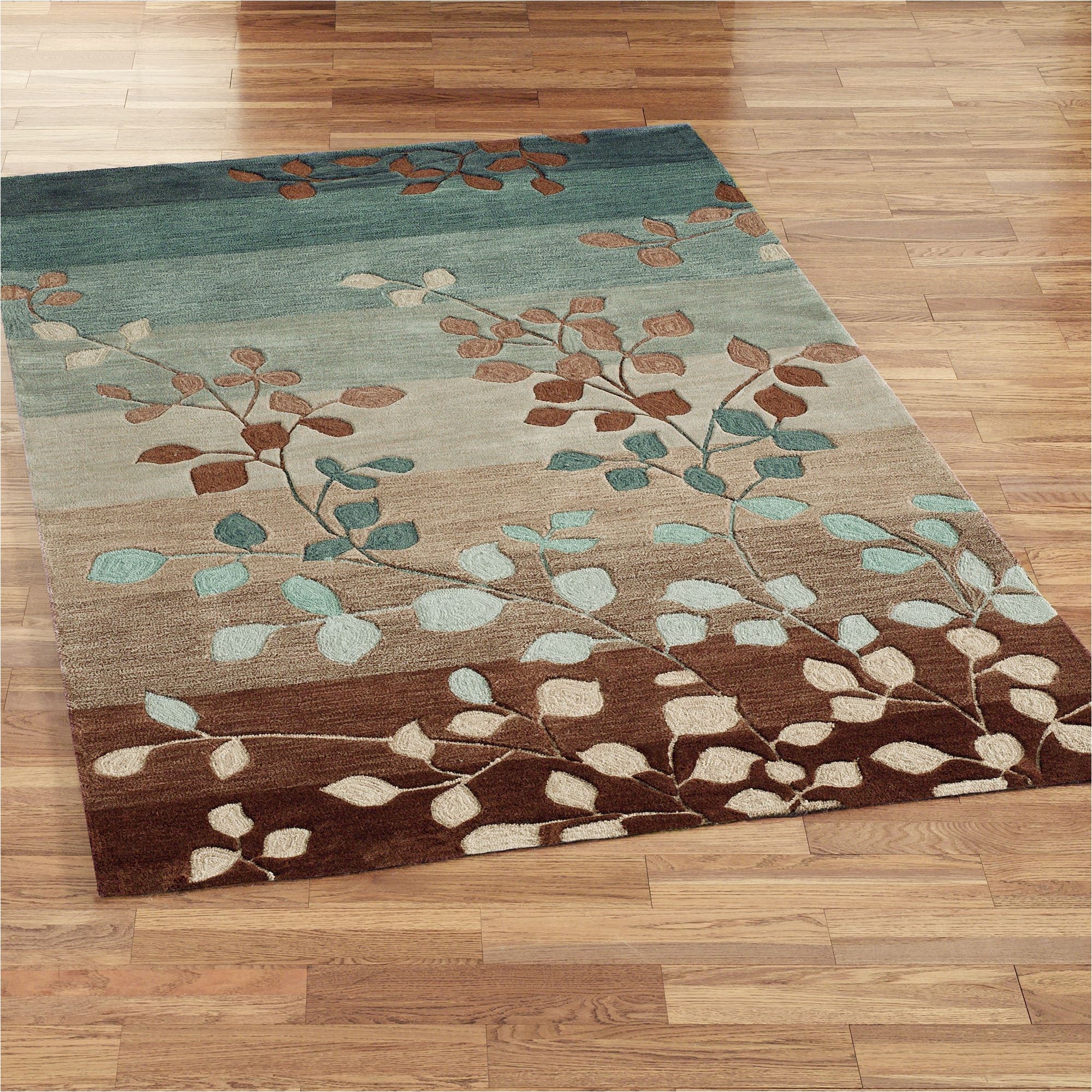 sydney leaf area rugs add a fun touch of color to your decor hand tufted in china of polyacrylic the thick area rugs have hand hooked accents