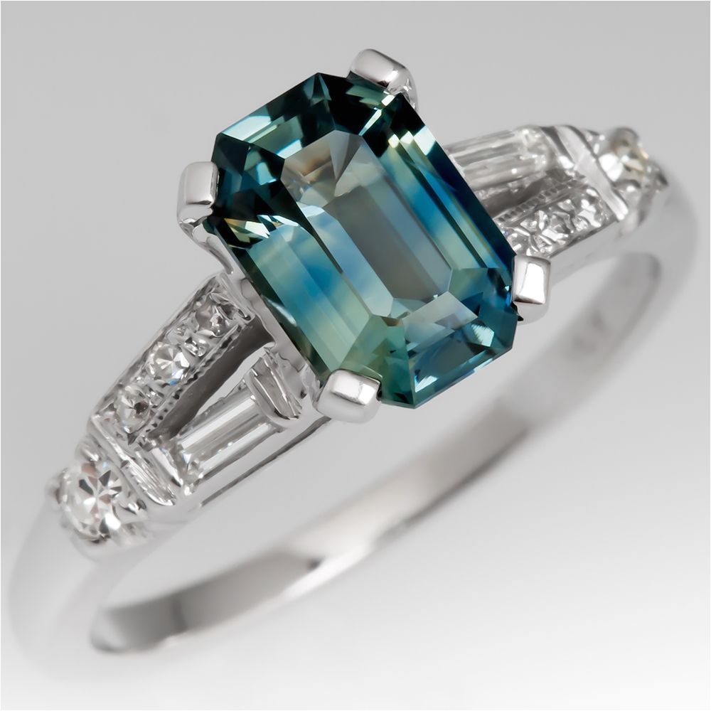 shimmery light blue green sapphire engagement ring 1950s mounting