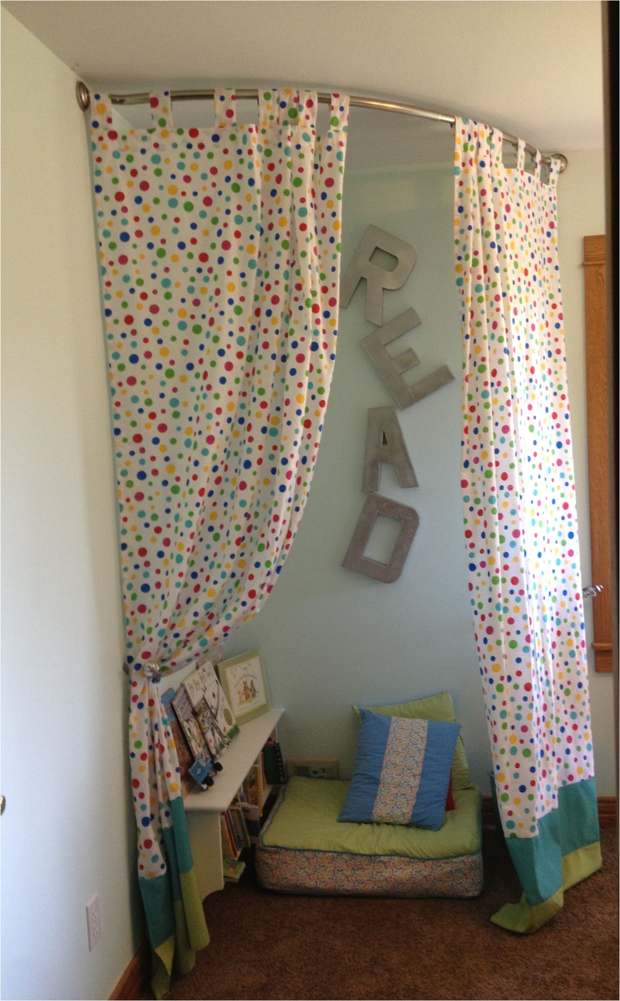 i finally finished the kids reading nook area in our homeschooling classroom i made a cushion pad and pillows also added the word read