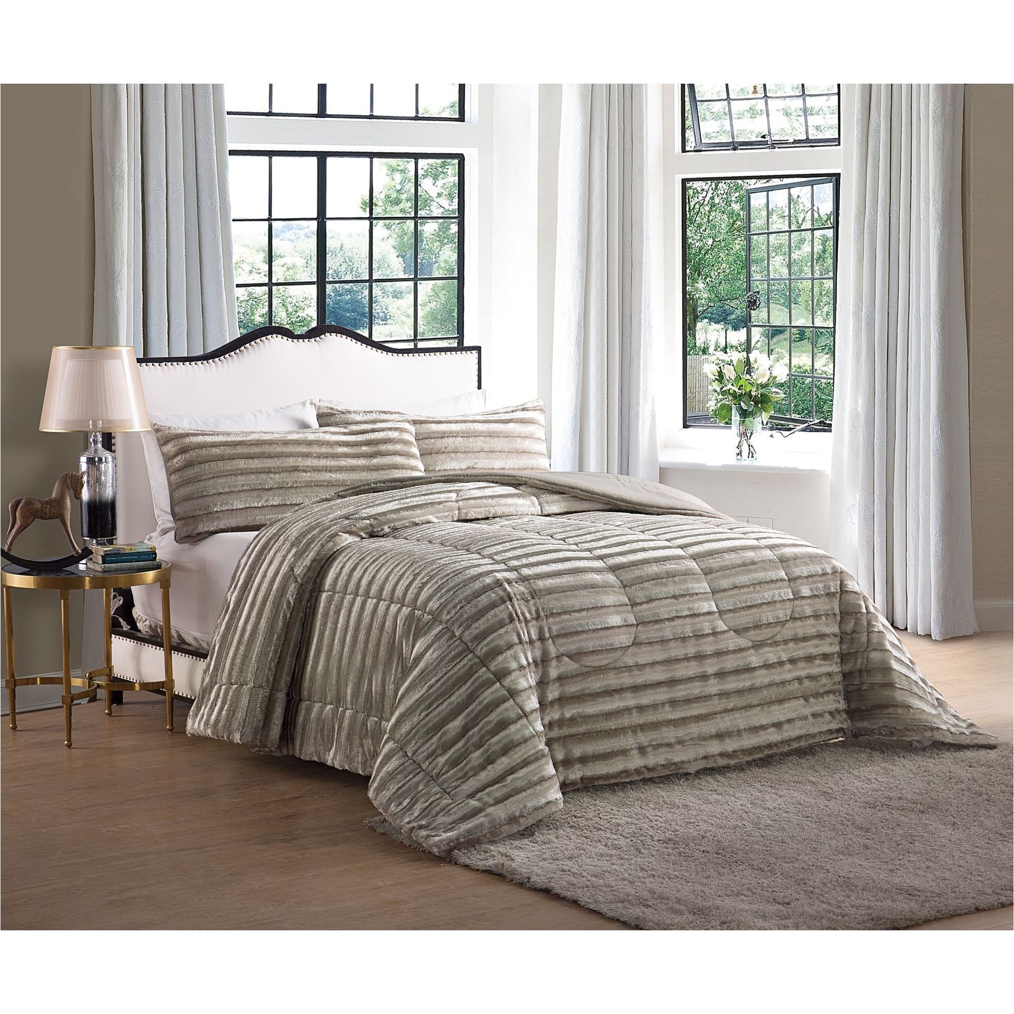 create a warm and cozy space with this luxurious faux fur comforter the beautiful design