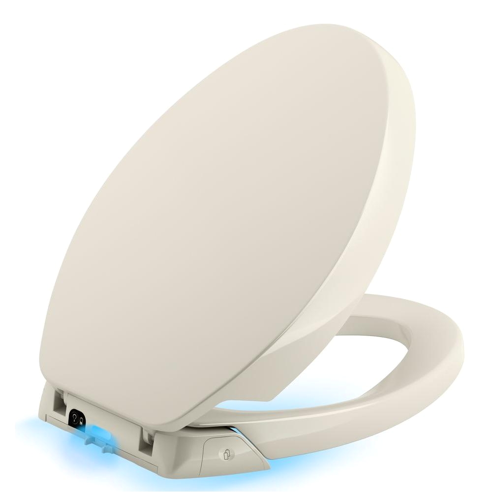 kohler purefresh elongated closed front toilet seat in biscuit