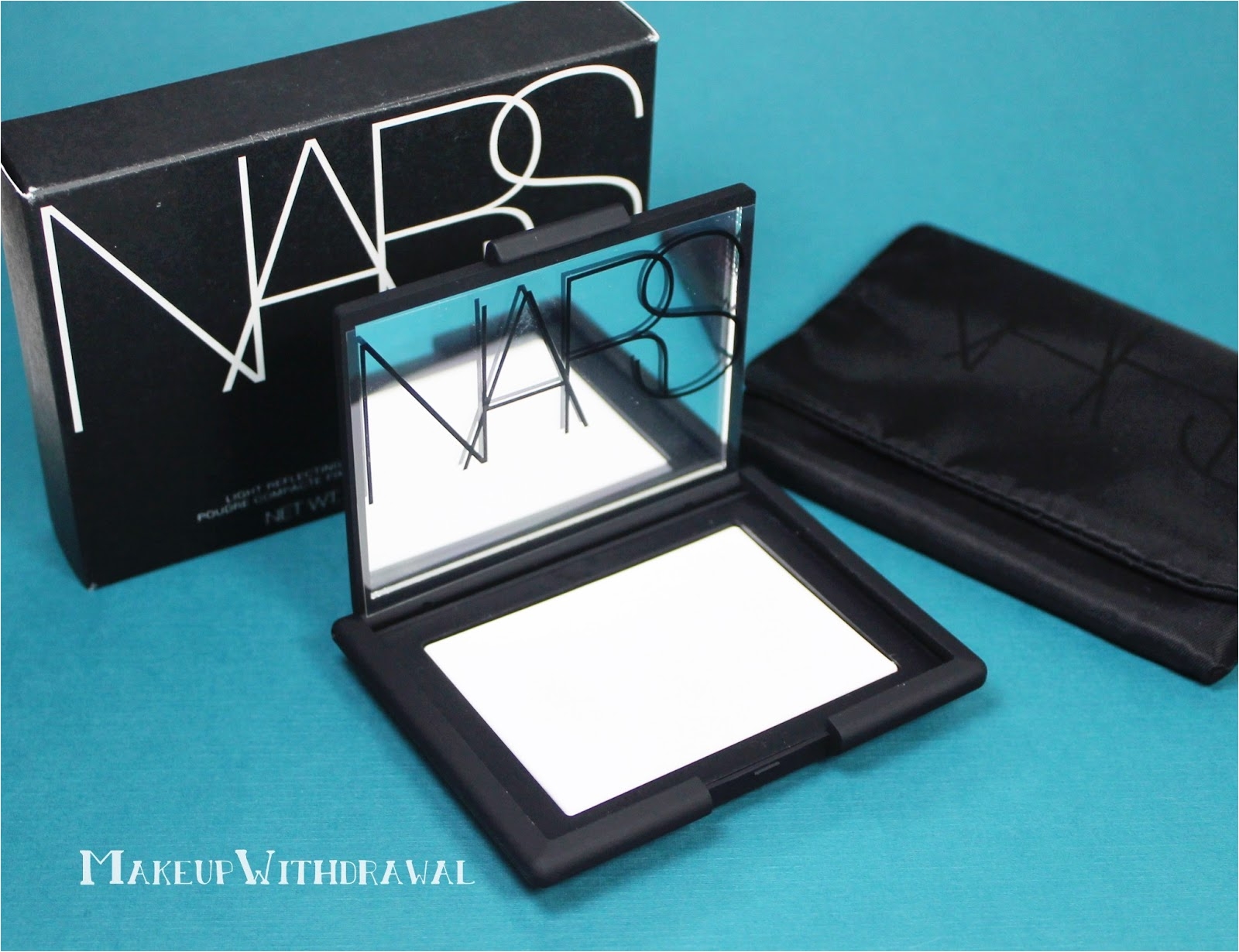 review nars light reflecting pressed powder