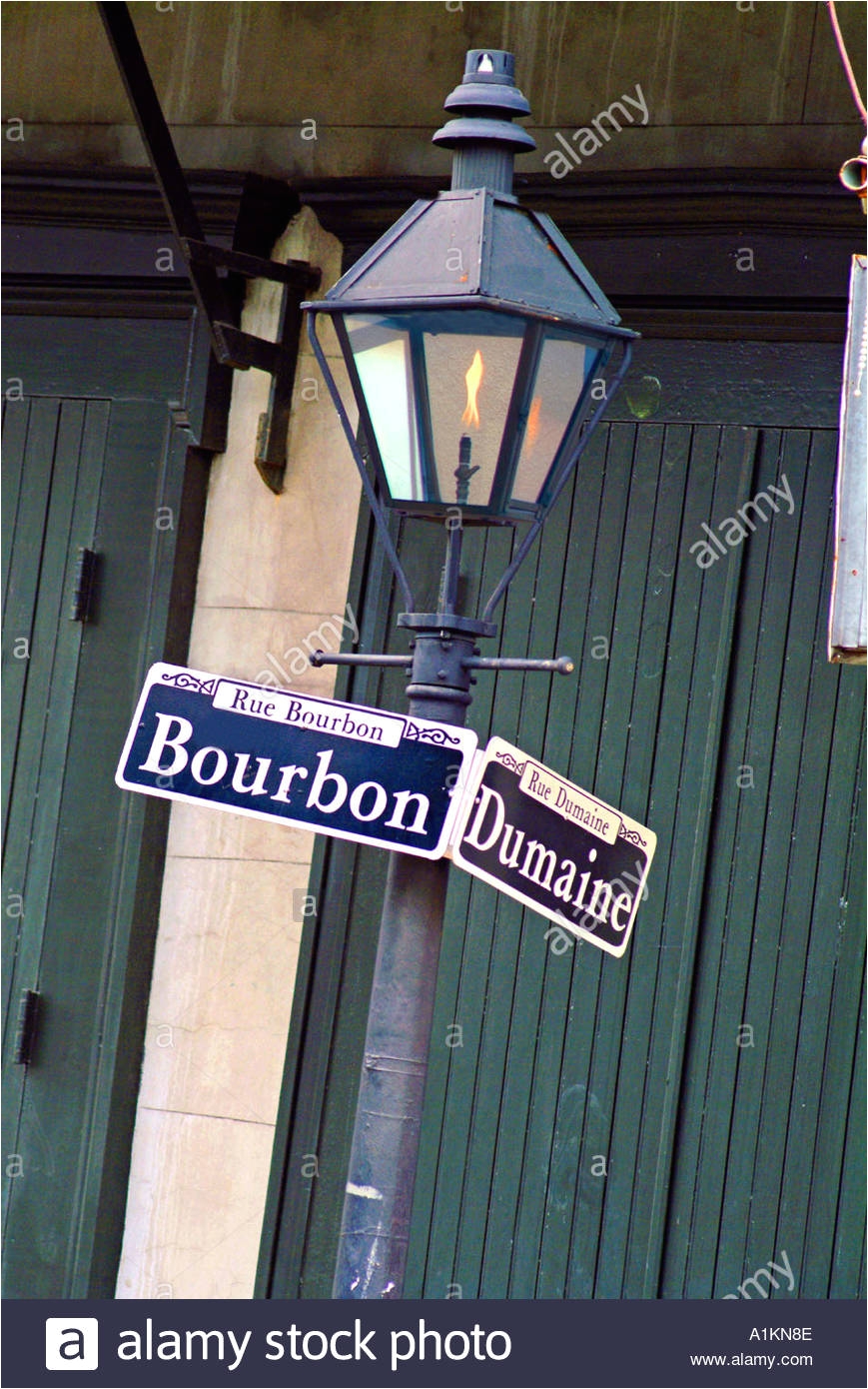 gas lamp and street sign in new orleans louisiana stock image