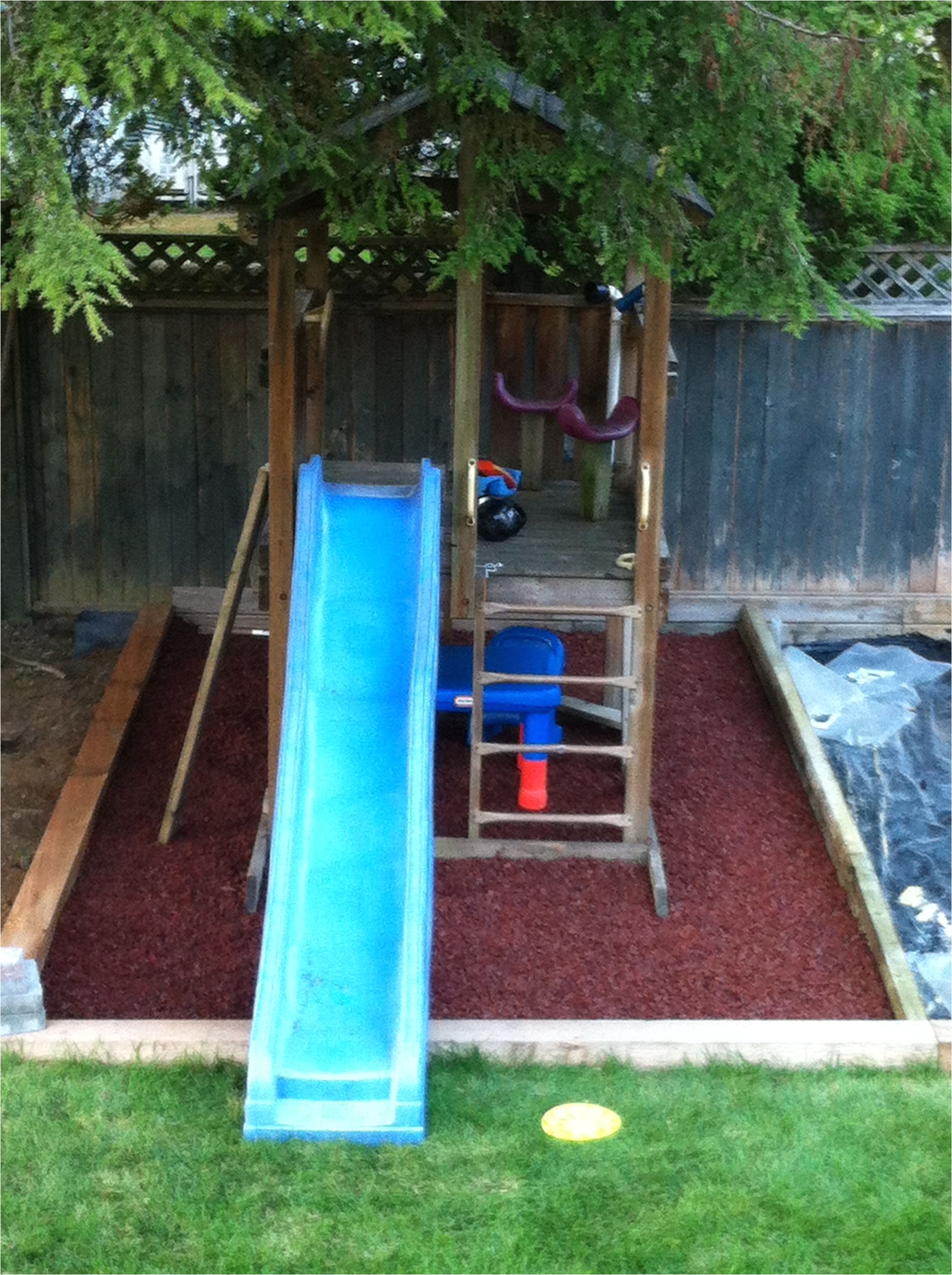 playground we built for our little guy we used rubber mulch