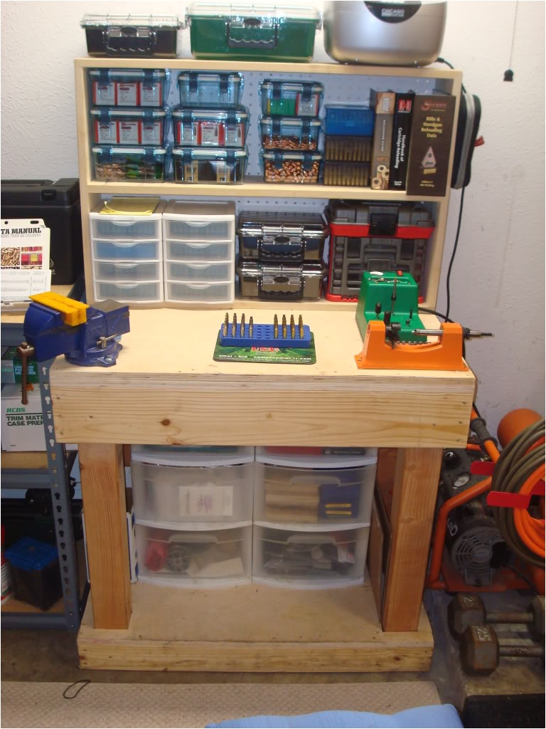 here is a photo of a similar bench but built 2x3 for storage and case prep beside the one i use to load on