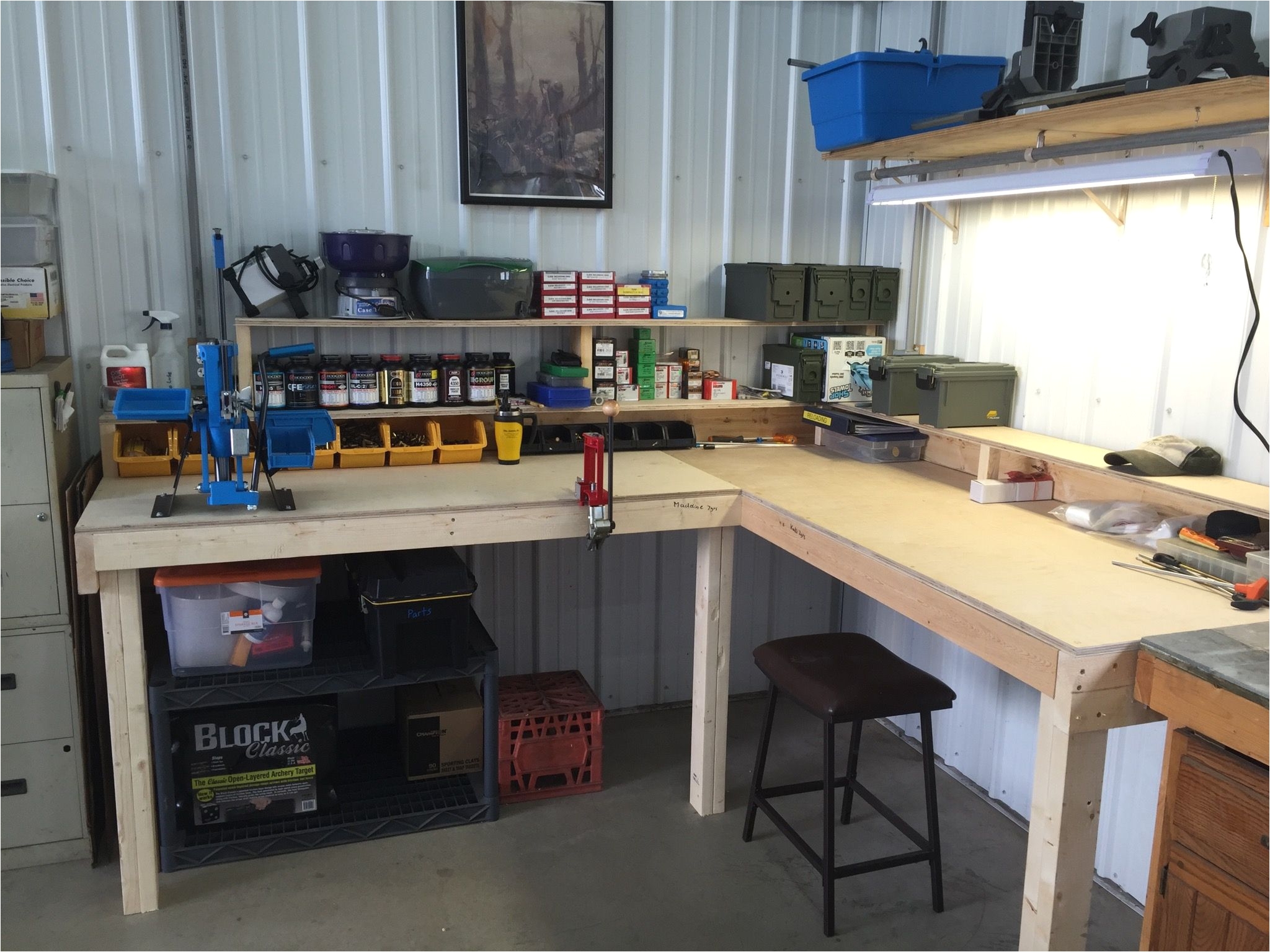 reloading bench and gun cleaning area more