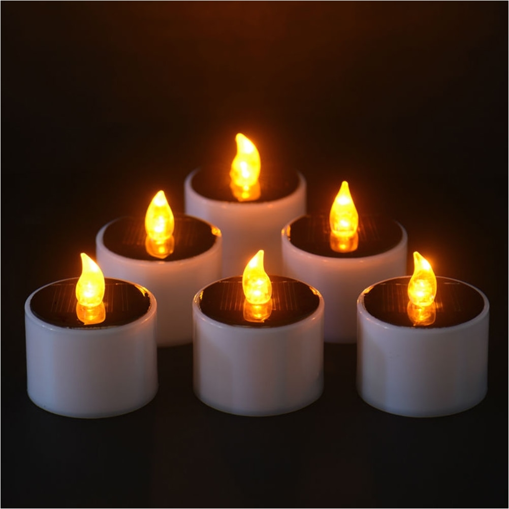 solar energy candle plastic yellow solar power led candles flameless electronic solar led tea lights