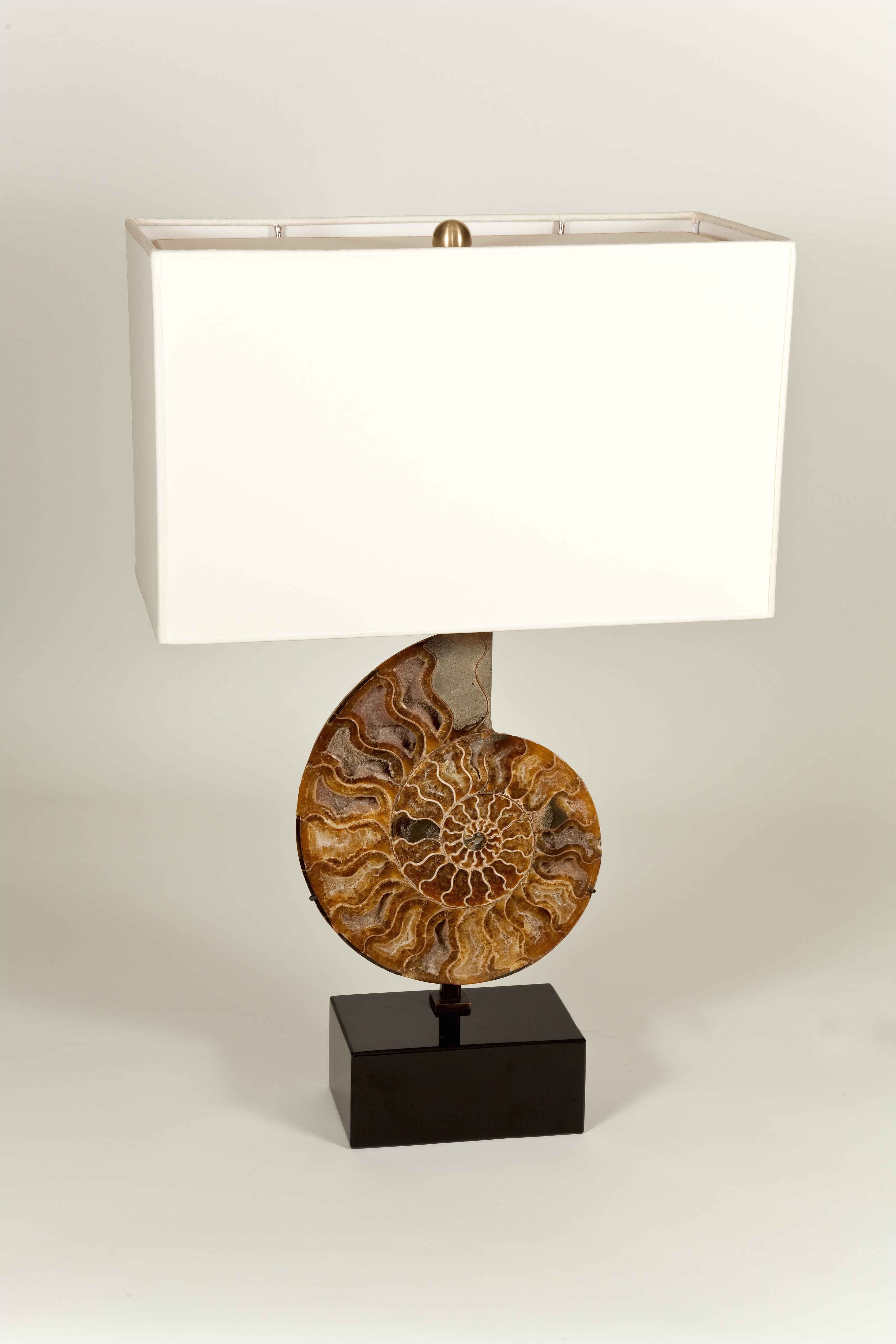 ammonite fossil table lamp linen shade and a black marble base