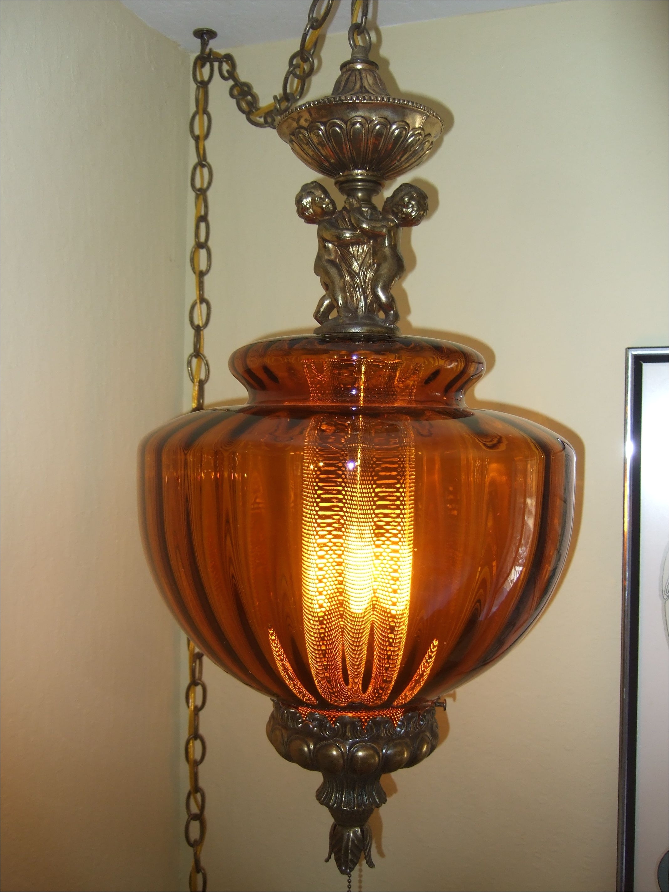 cherub amber swag lamp that i designed and made from different lamp parts vintage light