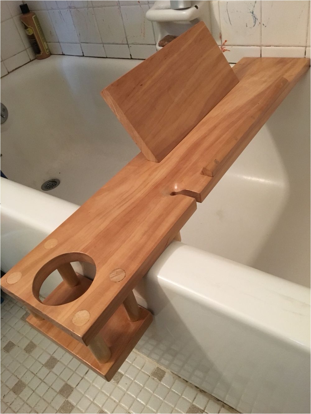 bathtub buddy for my wife it holds a book or tablet so you can read