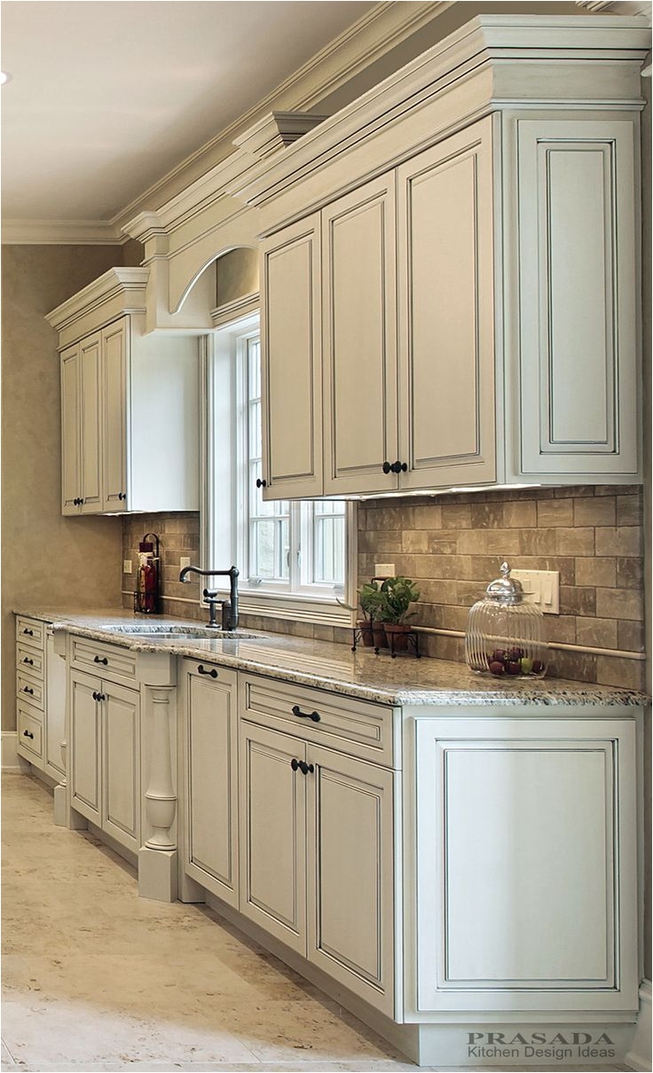 Classic kitchen f white with clipped corners on the bump out sink granite countertop arched valance