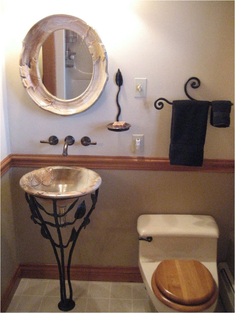 Small Corner Bathroom Sink Design Ideas Bathroom Vintage Vessel Sink With Wonderful Bas Relief Design And Leaf And Branch Wrought Iron Pad