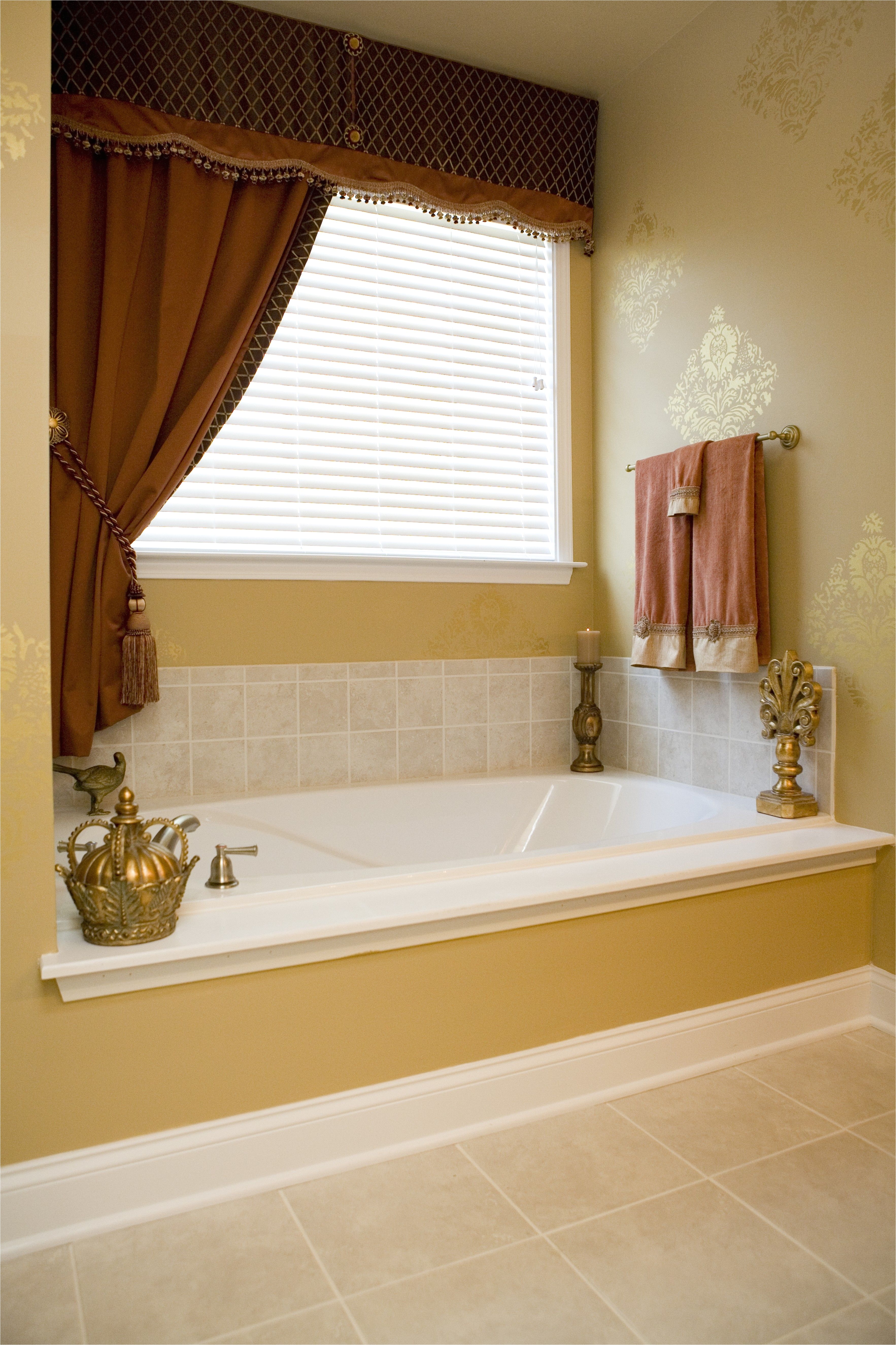 Custom made window treatments with beaded trim and rosettes interior design