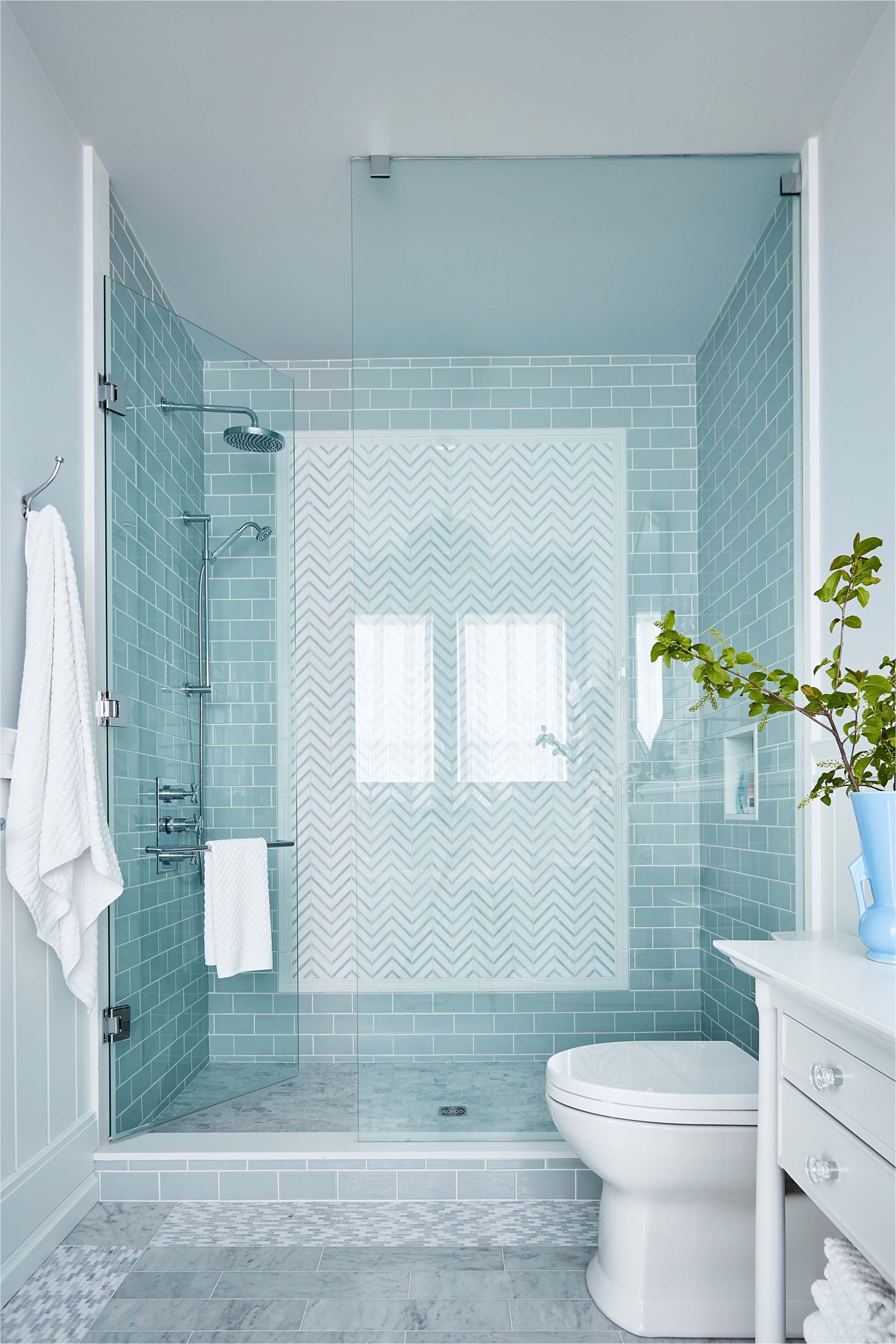 Aqua shower tile with grey floor tile in Robin s country bathroom Sarah Richardson Sarah off the Grid HGTV