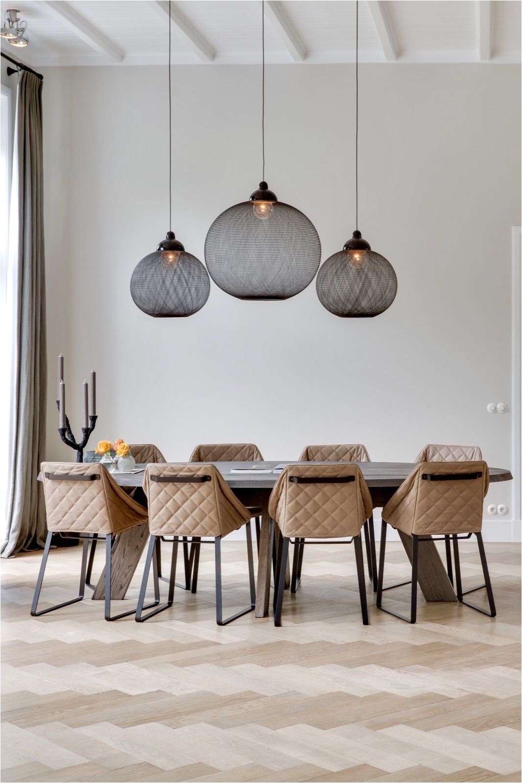 Dramatic pendant lights great with a full height ceiling
