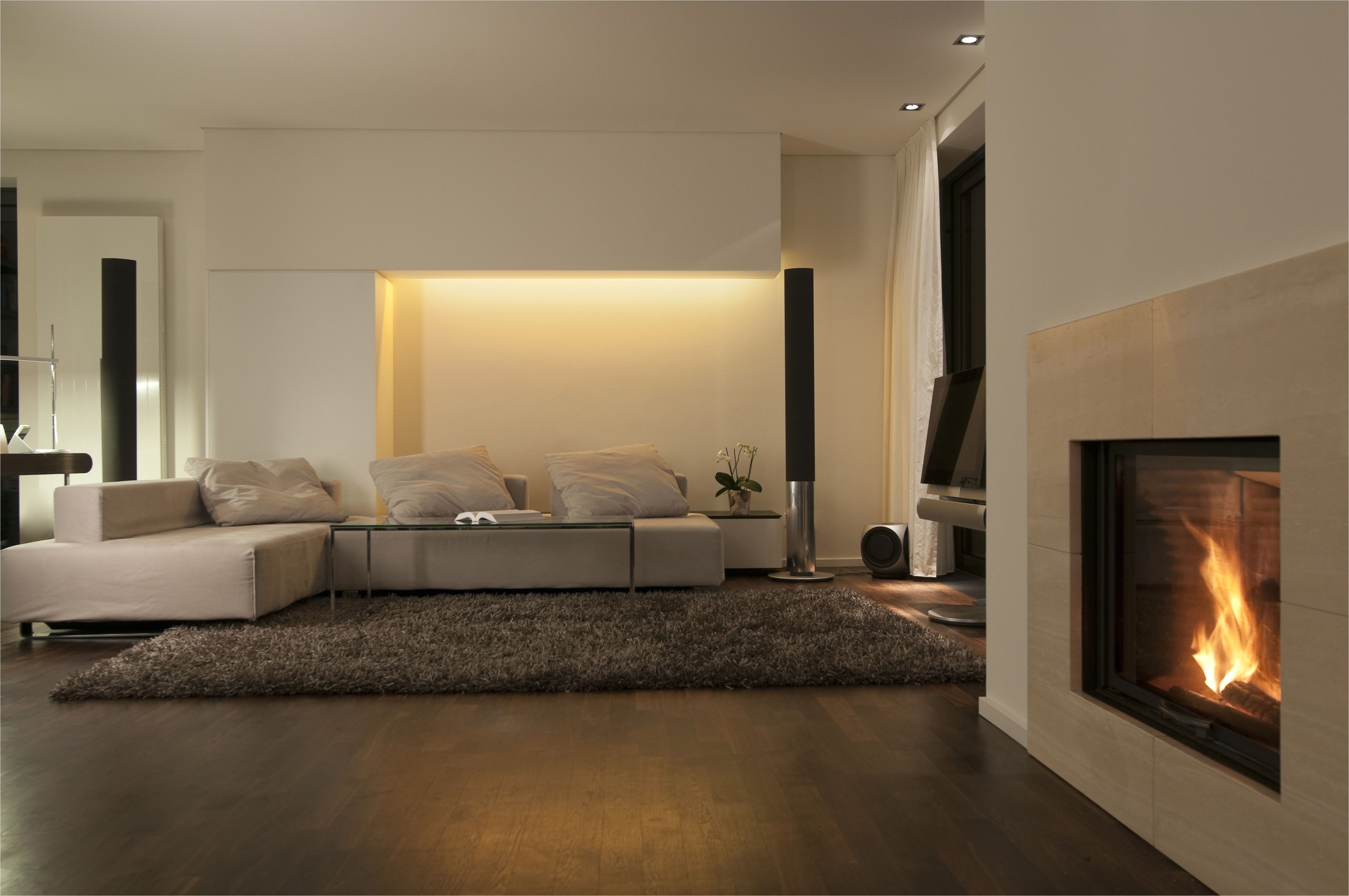 modern living room with fireplace and wooden floor 5a007fd9b39d ecdede