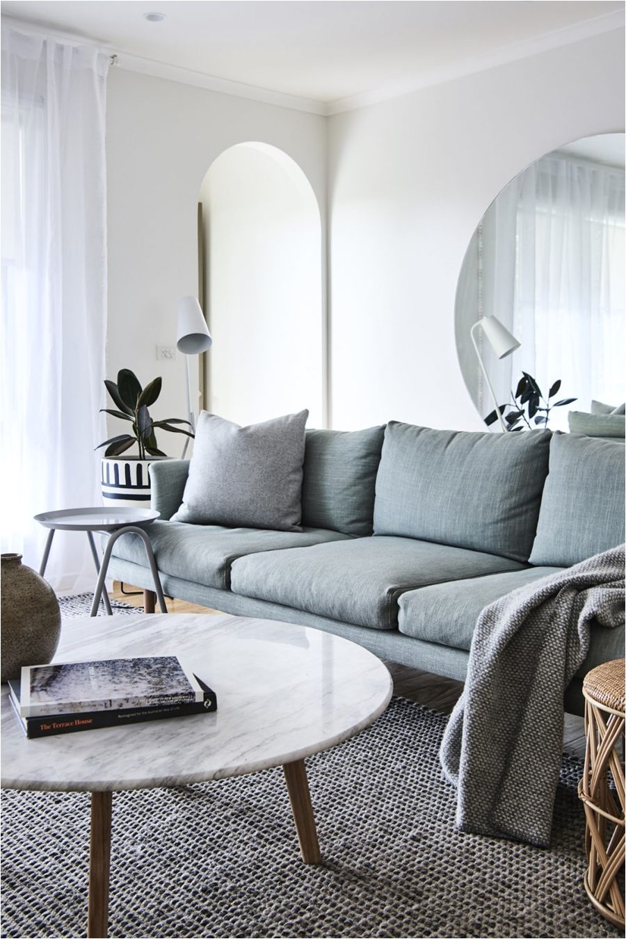 White Marble table with muted blue couch Living edor Living Room Interior Home Living