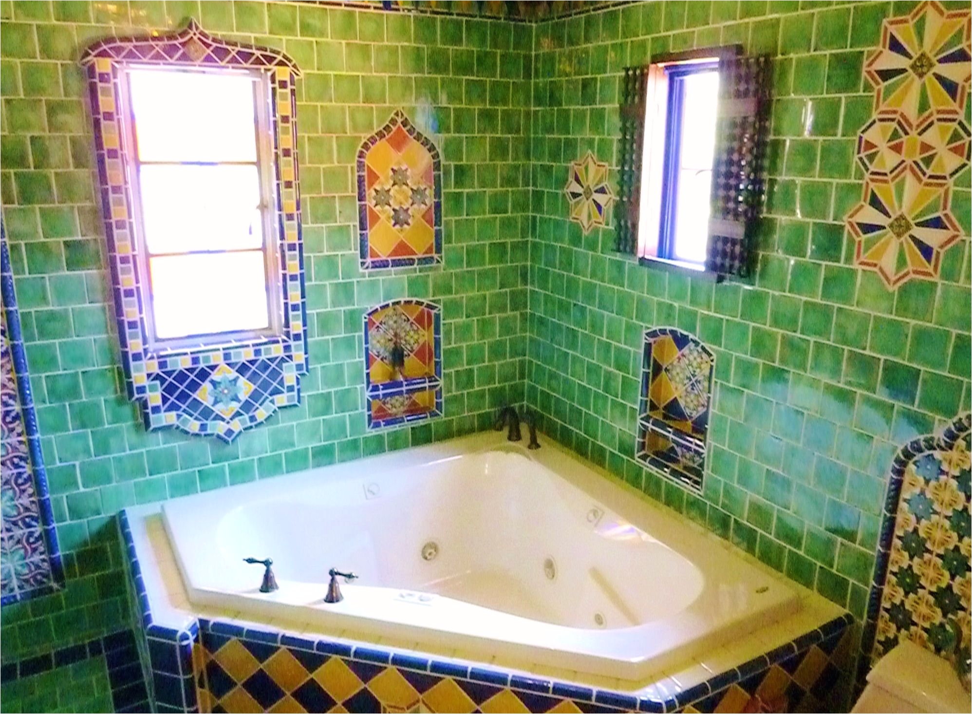 This might be a little over the top but we like the idea of brining some Mexican tiles and details into the bathrooms