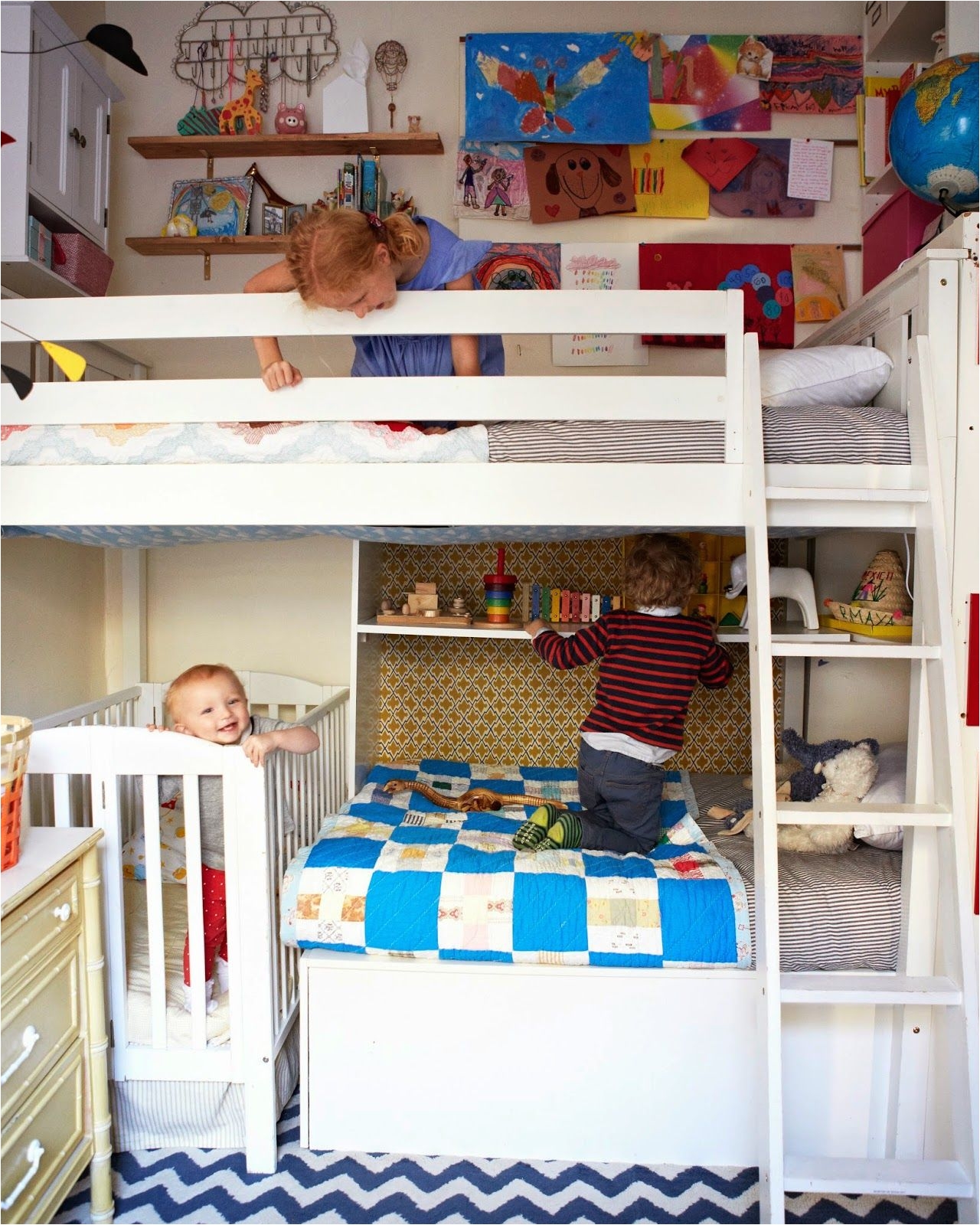 small shared bedroom with three kids