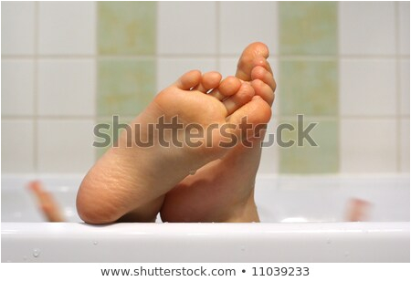 stock photo baby feet on the bathtub