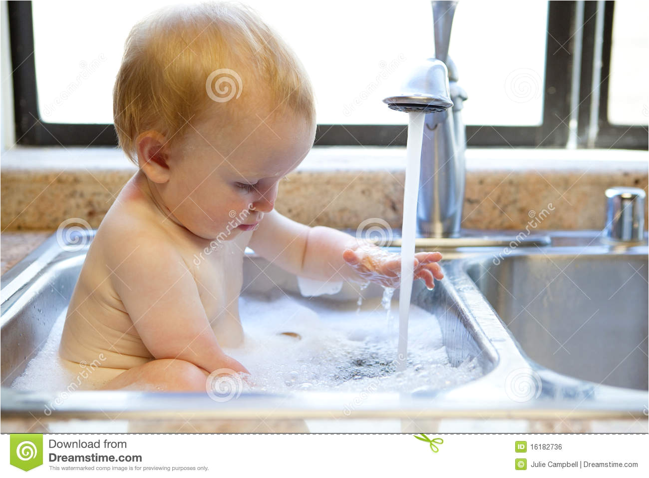 royalty free stock image baby taking bath sink image