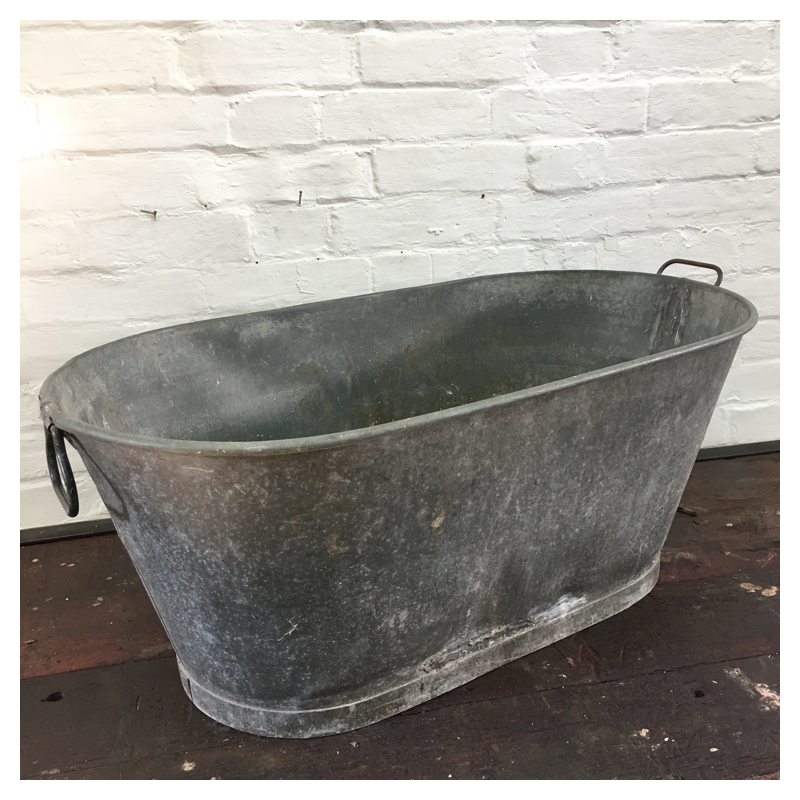 galvanised baby bath planter