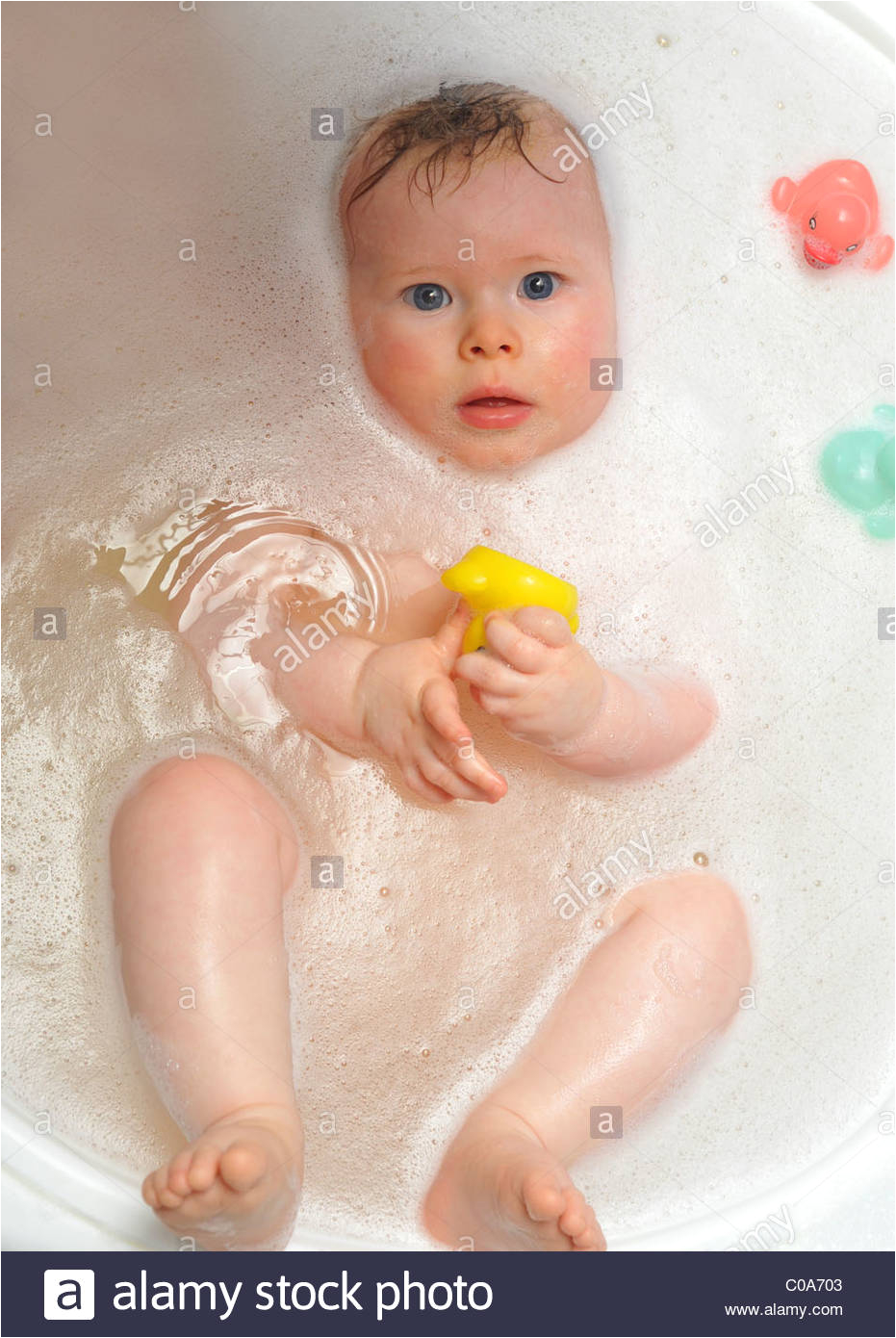 stock photo cute 6 month old baby bath bathtime toy ducks play infant clean lovely