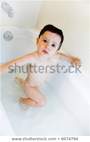 stock photo brother and sister taking a bubble bath view from above