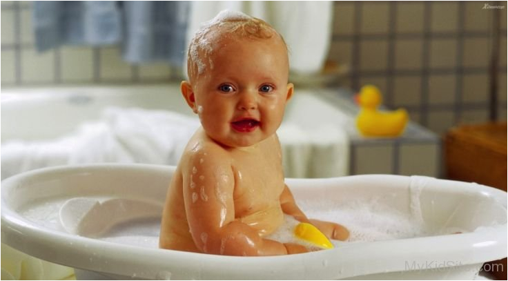 cute baby boy bathing