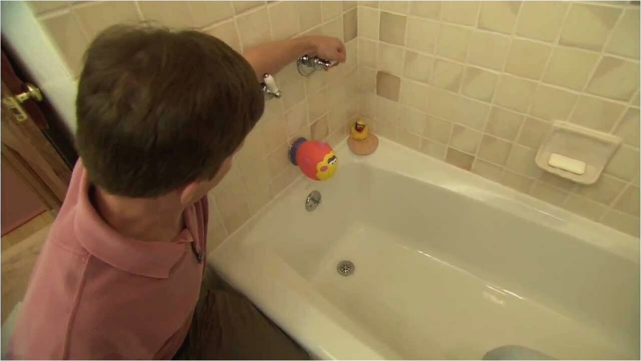 essentials push down bathtub stopper