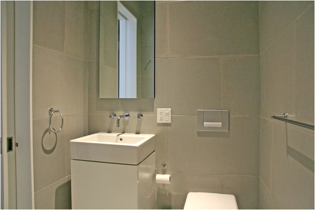 Concrete wall panels and batchroom floor modern bathroom tile new york