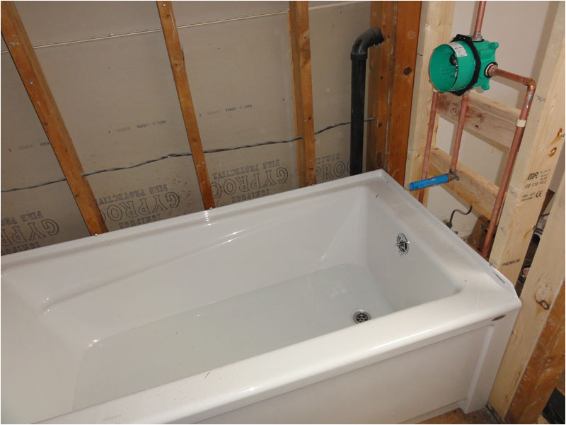 mortar bed under fiberglass whirlpool tub how thick