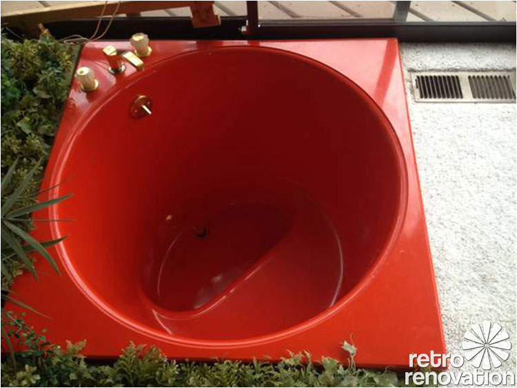 red round sunken kohler bath tub
