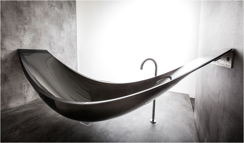 a hammock shaped carbon fibre bathtub by splinter works