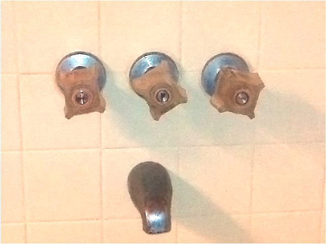 conversion of a 3 handled tub shower valve to a single handle type 450