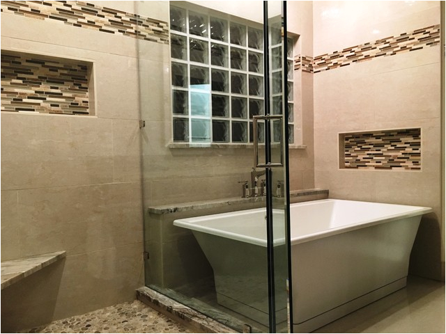 MASTER BATHROOM Free Standing Tub Crema Marfil Tile White Reef Granite contemporary bathroom austin