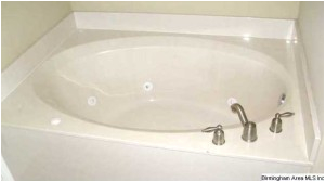 relax in the large jetted garden tub there is also a separate shower in the master bath