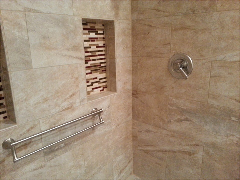 decorative grab bars for a tile shower