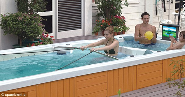 The worlds coolest hot tub The tiered jacuzzi es bar flat screen TV inbuilt sound system