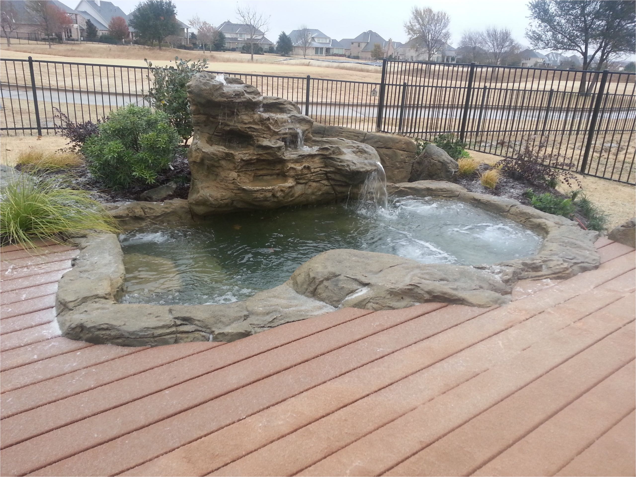 large rock hot tub spa